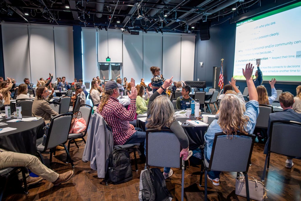 Summit participants and speakers gathered for closing reflections.