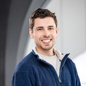 Headshot of Will Sharpe.