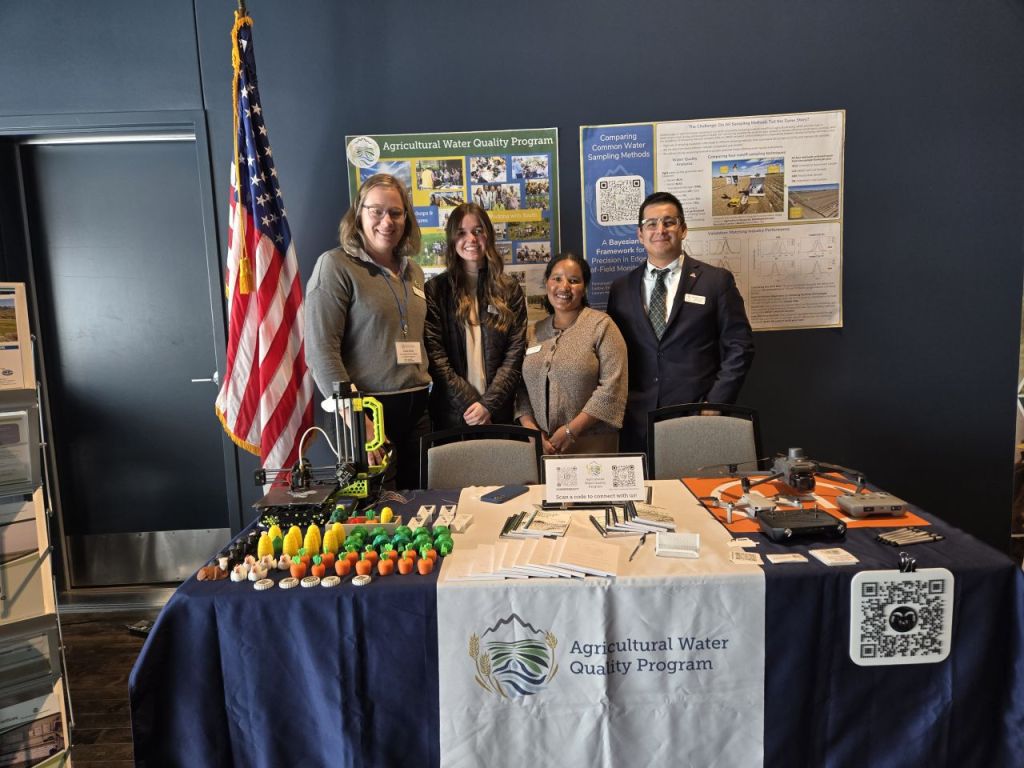 The CSU Ag Water Quality Program team poses behind their WW Career Fair table